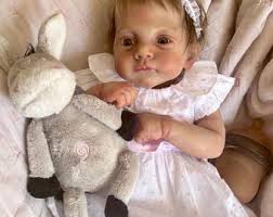 hyper-realistic baby dolls created with love, artistry, and incredible detail.